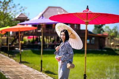 Portrait of woman standing outdoors