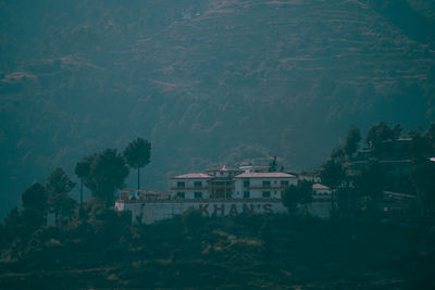 Houses and trees on mountain