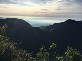 Scenic view of mountains against sky during sunset