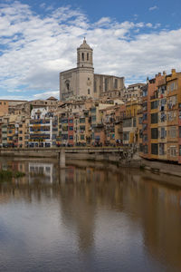 Reflection of buildings in water, , girona spain