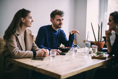 Group of people sitting at table