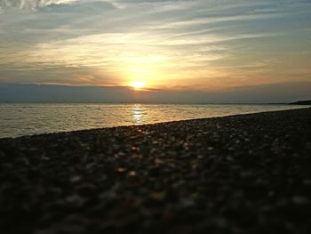 Scenic view of sea at sunset