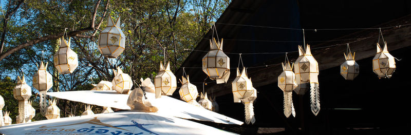 View of illuminated lanterns hanging from boat