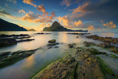 Scenic view of sea against sky during sunset