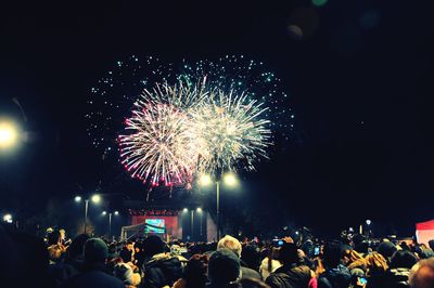 Firework display at night