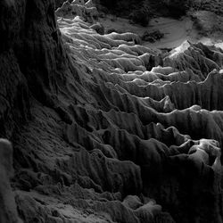 Scenic view of frozen rocks in winter