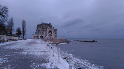 View of historical building against cloudy sky