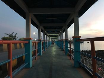 Corridor of bridge against sky