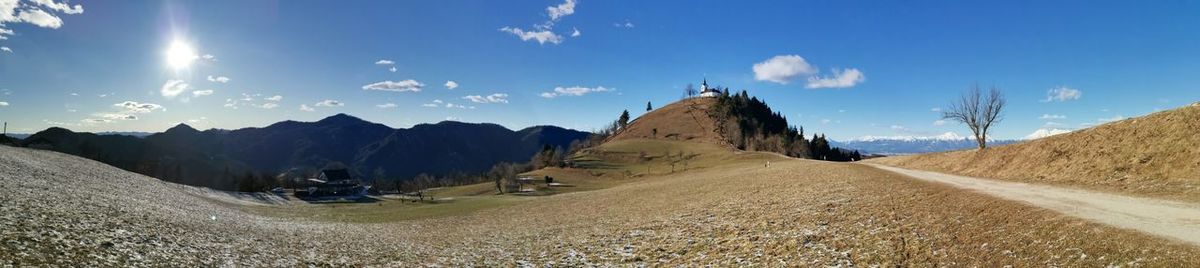 Panoramic view of landscape and mountains against sky