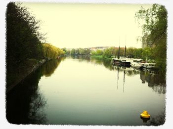 View of boats in calm lake