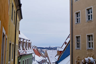 Buildings in meissen town against sky during winter