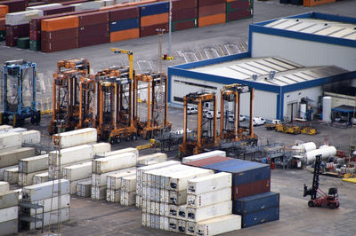 Row of industry in building with cargo container at commercial dock 