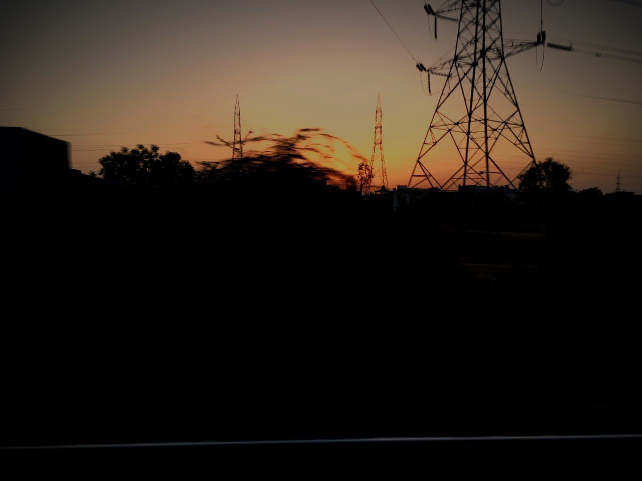 SILHOUETTE OF TREES AGAINST SKY DURING SUNSET