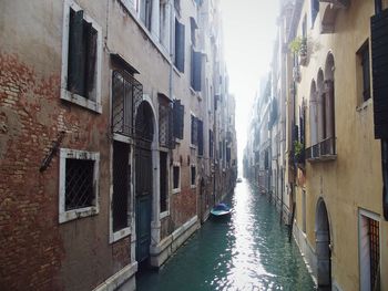 Narrow canal along buildings