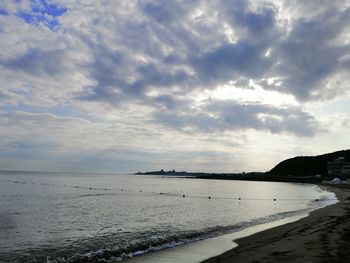 Scenic view of beach against sky
