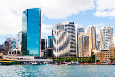 Modern buildings in city against sky