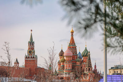 Panoramic view of moscow kremlin with spassky tower and saint basil's cathedral in center city