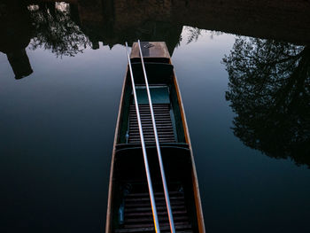 Low angle view of built structure in lake against sky