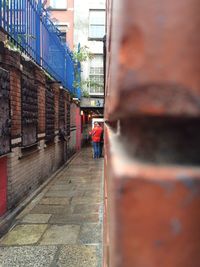 Man walking on sidewalk