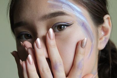 Close-up portrait of young woman