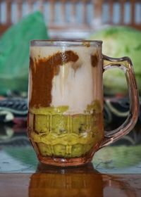 Close-up of beer glass on table