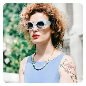 Portrait of woman wearing sunglasses