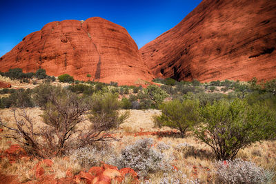 Rock formations in desert against sky