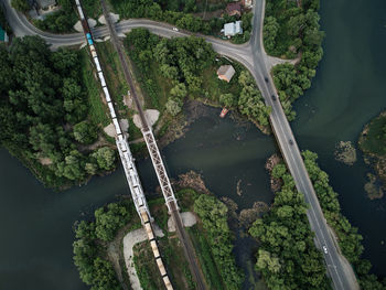 High angle view of bridge over river by trees