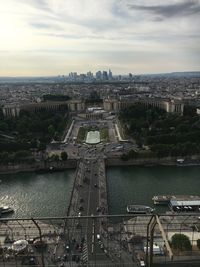 Cityscape against cloudy sky