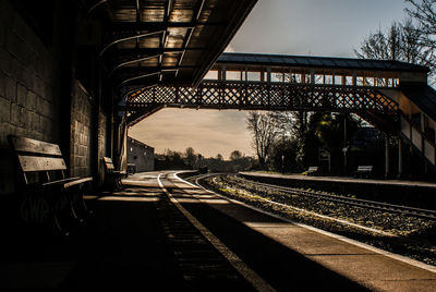 Bridge in city against sky