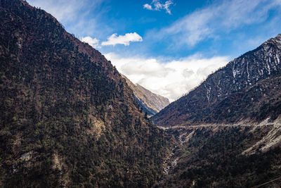 Himalaya mountain valley with bright blue sky at day from hilltop