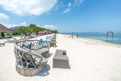 View of beach against blue sky