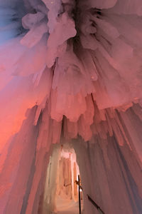 Low angle view of rock formations during winter