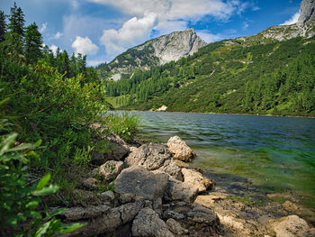 Scenic view of rocks in mountains against sky