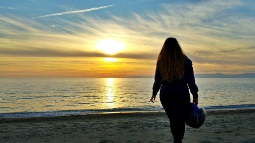 Scenic view of sea at sunset