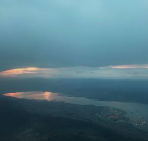 Scenic view of sea against sky at sunset