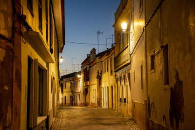 Illuminated street at night