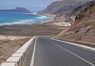 Panoramic view of road leading towards sea