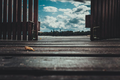 Surface level of railroad track against sky