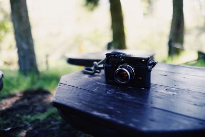 Close-up of camera on table