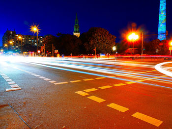 Light trails on road at night
