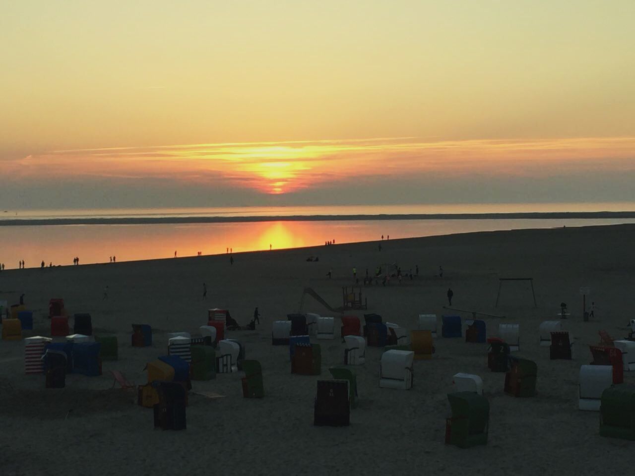 VIEW OF BEACH AGAINST SKY DURING SUNSET