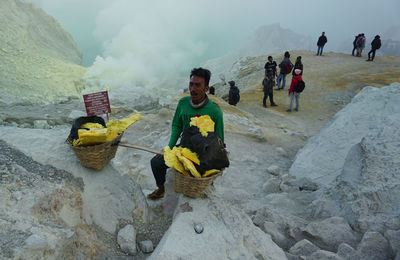 Group of people on rock