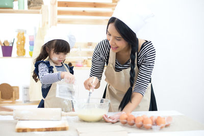 Women preparing food at home