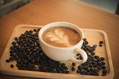 High angle view of coffee cup on table