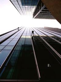 Low angle view of modern skyscraper against sky