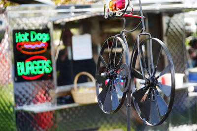 Artificial bicycle against food stand