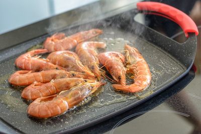 Close-up of prawns in cooking pan