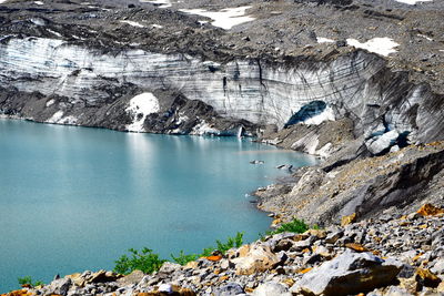 High angle view of rocks in sea