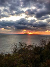 Scenic view of sea against sky during sunset